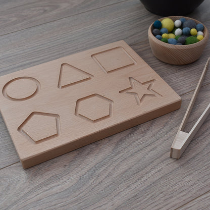 Montessori inspired sustainable wooden shape board and felt balls