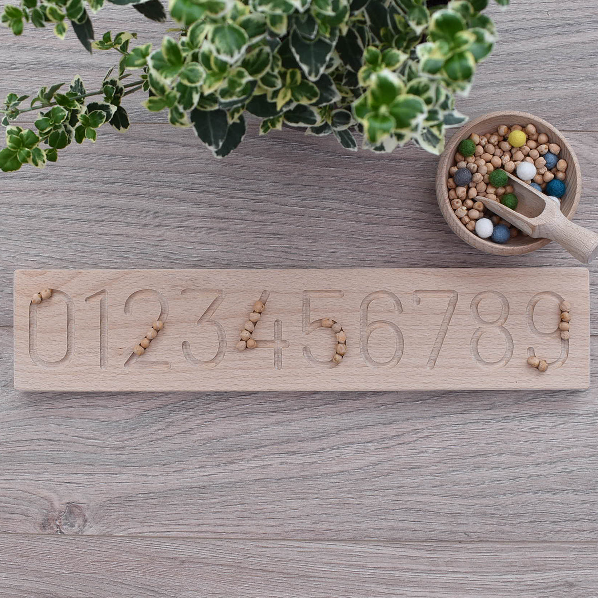 UK made wooden number board for sensory play and fine motor skills, made from sustainable Beech with chick peas and felt balls