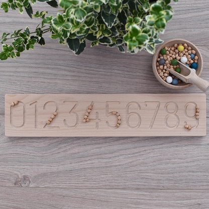 UK made wooden number board for sensory play and fine motor skills, made from sustainable Beech with chick peas and felt balls