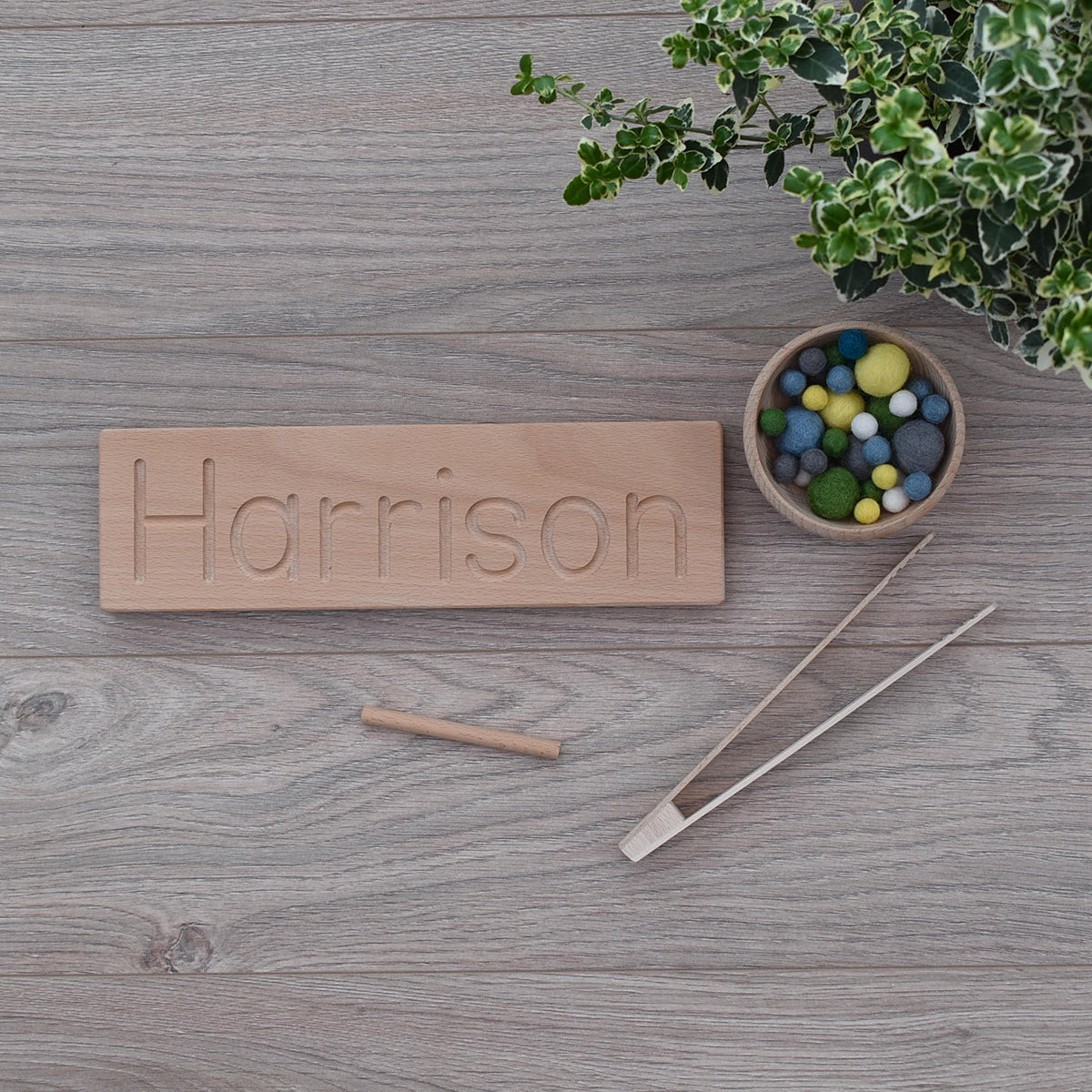 Harrison DrawMe personalised wooden name board used for learning to write and fine motor skill sensory play