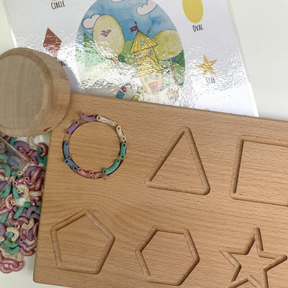 Montessori inspired sustainable wooden shape board and lentils