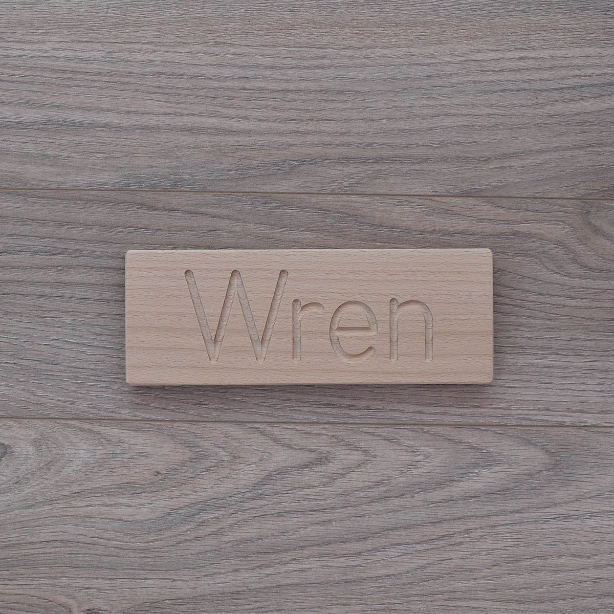 Wren DrawMe personalised wooden name board used for learning to write and fine motor skill sensory play